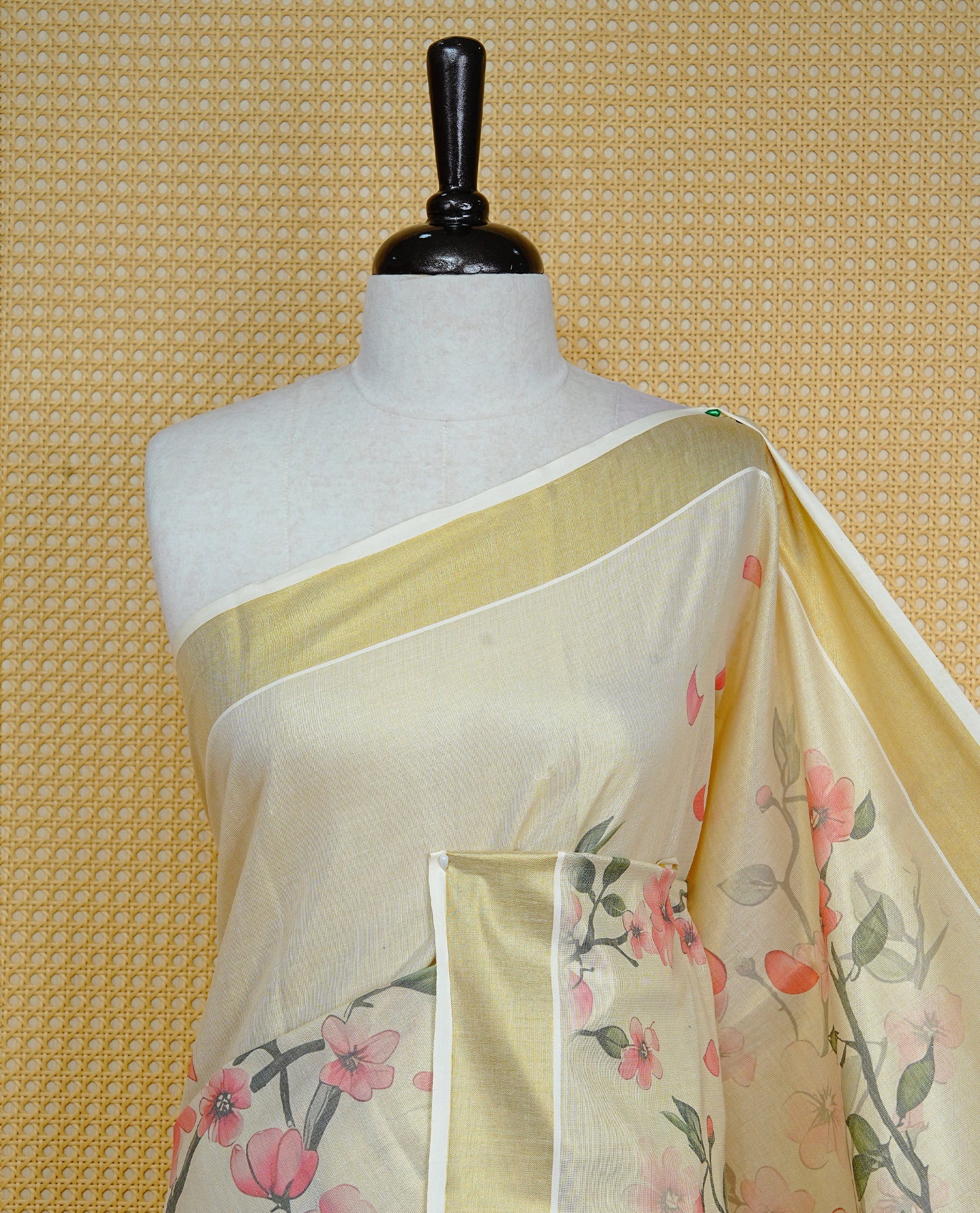 Cream colour Tissue kerala saree featuring Floral print on body, complemented by Floral Print & kasavu kara, comes with matching blouse piece.