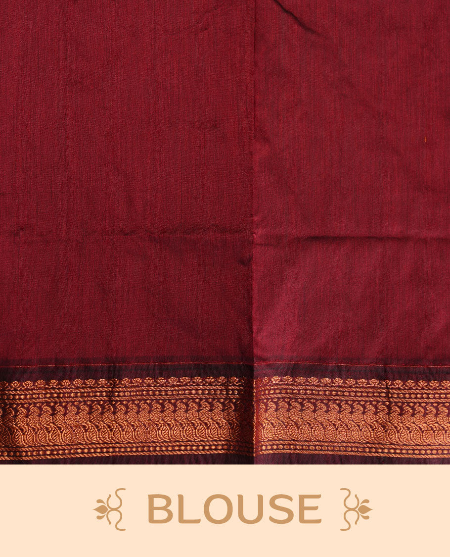 Green colour kalyani cotton saree featuring antique zari motifs on body, complemented by Maroon colour with Antique zari border, paired with matching blouse piece.