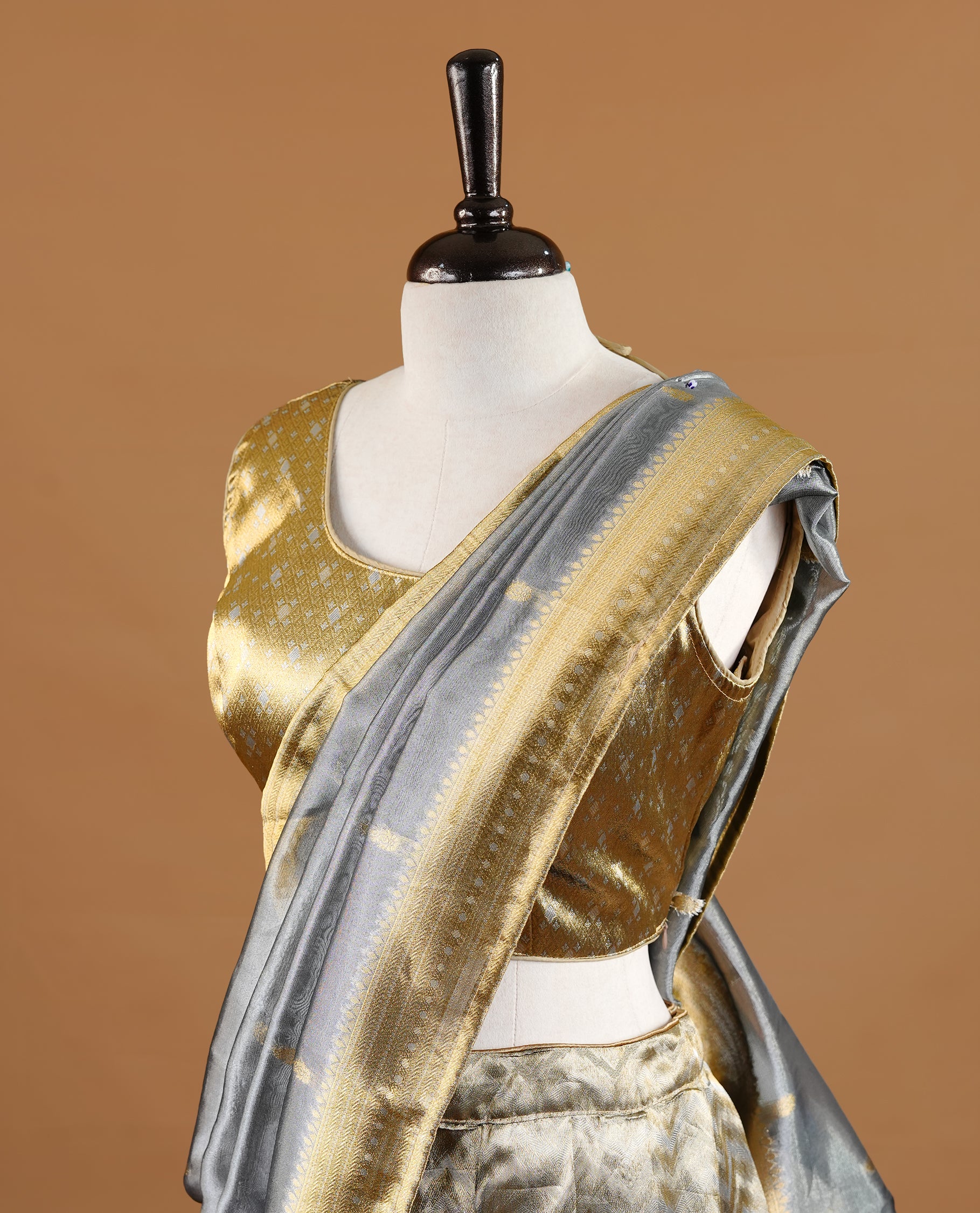 Antique gold colour semi stitched Half saree featuring contrast gold colour with traditional zari border skirt, paired with matching zari border dupatta,stitched blouse piece