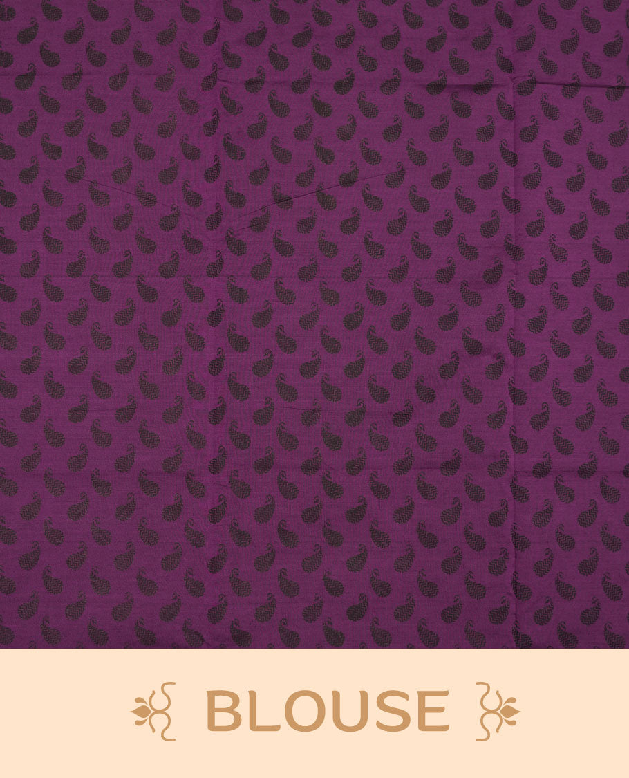 Grape Purple colour poly cotton saree with black floral butti motifs on the body, paired with a matching pallu featuring black ornate floral jaal and stripes on the border, and a coordinated all‑over black paisley printed blouse piece.