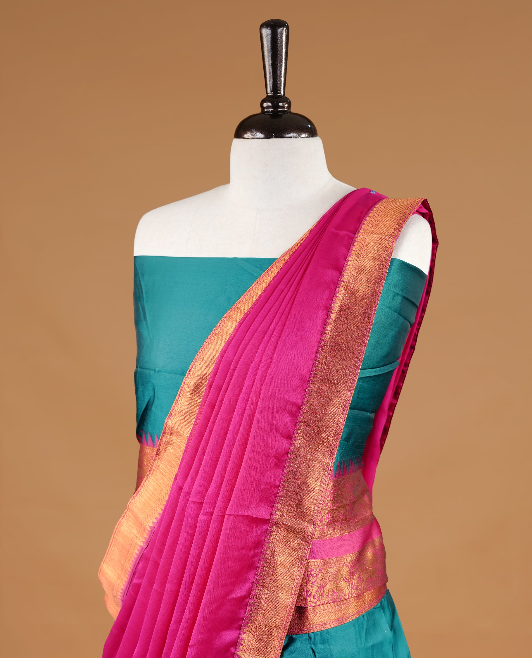 Green colour semi stitched Half saree featuring contrast Magenta colour with gold zari traditional border skirt, paired with matching zari border dupatta, unstitched blouse piece