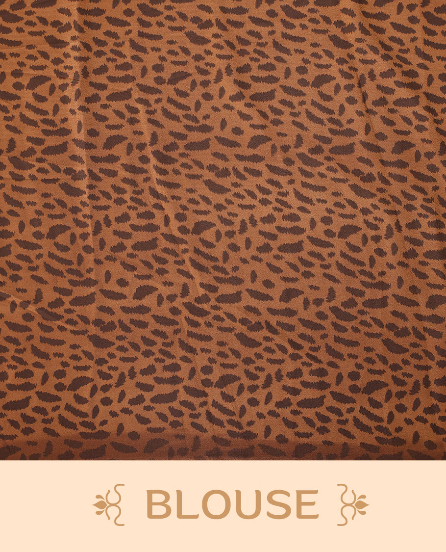 Brown colour semi modal silk saree with a striking leopard print across the body, complemented by a deep brown plain border, and paired with a matching blouse