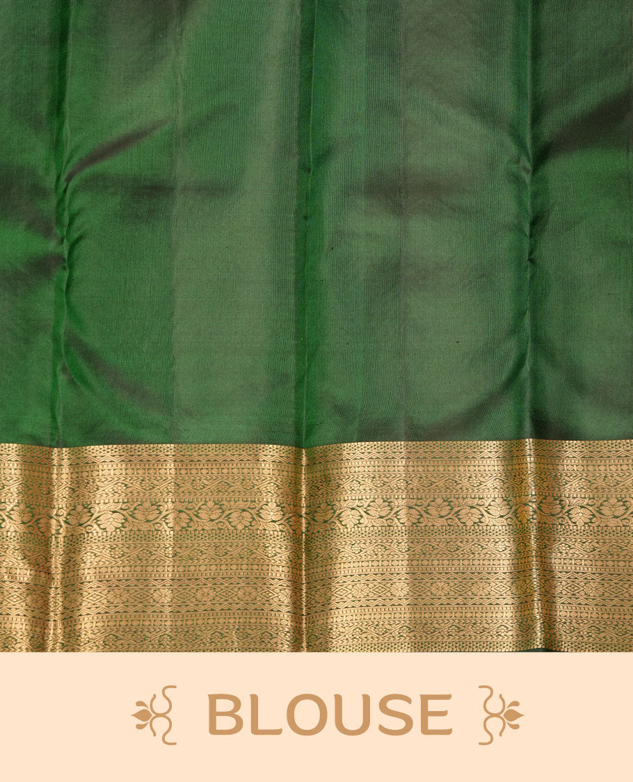 Bottle green colour kancheepuram silk sare featuring banaras floral zari jacquard on body with traditional border, paired iwth matching blouse piece.