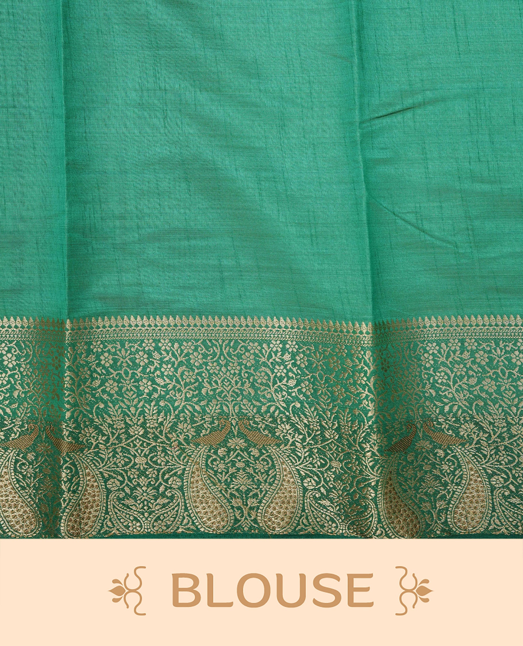 Light gold tussar saree featuring Elegant plain body, complemented by contrast green colour with Gold zari Floral kodi with Peacock Pattern border, comes with matching blouse piece.