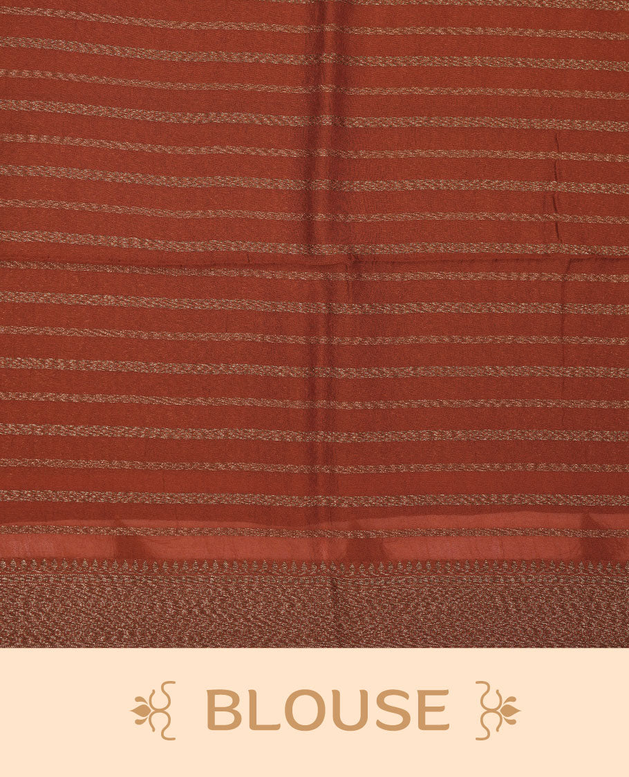 Burnt orange colour semi banaras tussar georgette featuring gold zari leaf pattern across body, finished with gold zari border and paired with matching blouse.