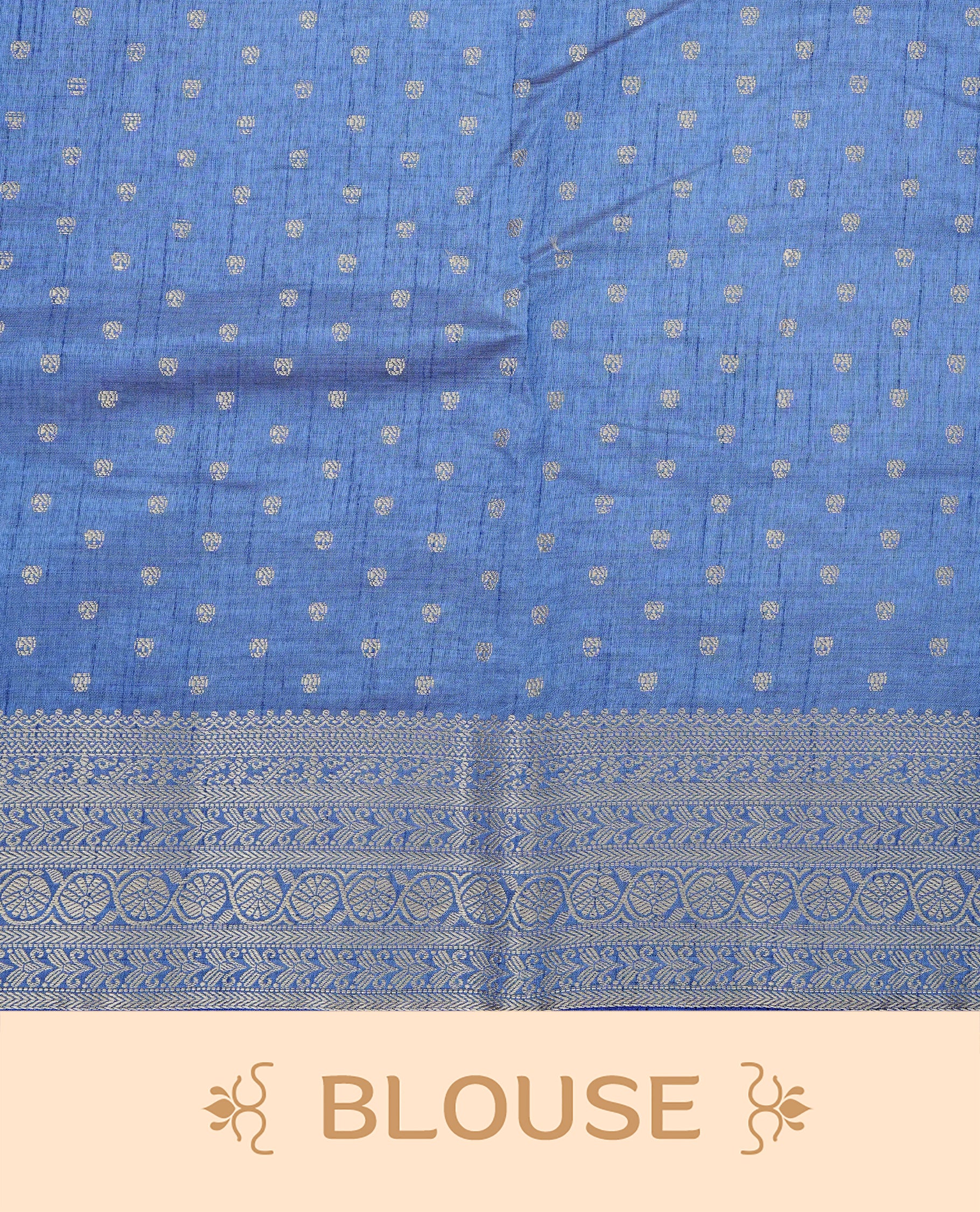 Light Gold Tussar saree featuring Gold zari buttas on body, complemented by contrast Blue Colour with Gold zari border, comes with matching blouse piece.