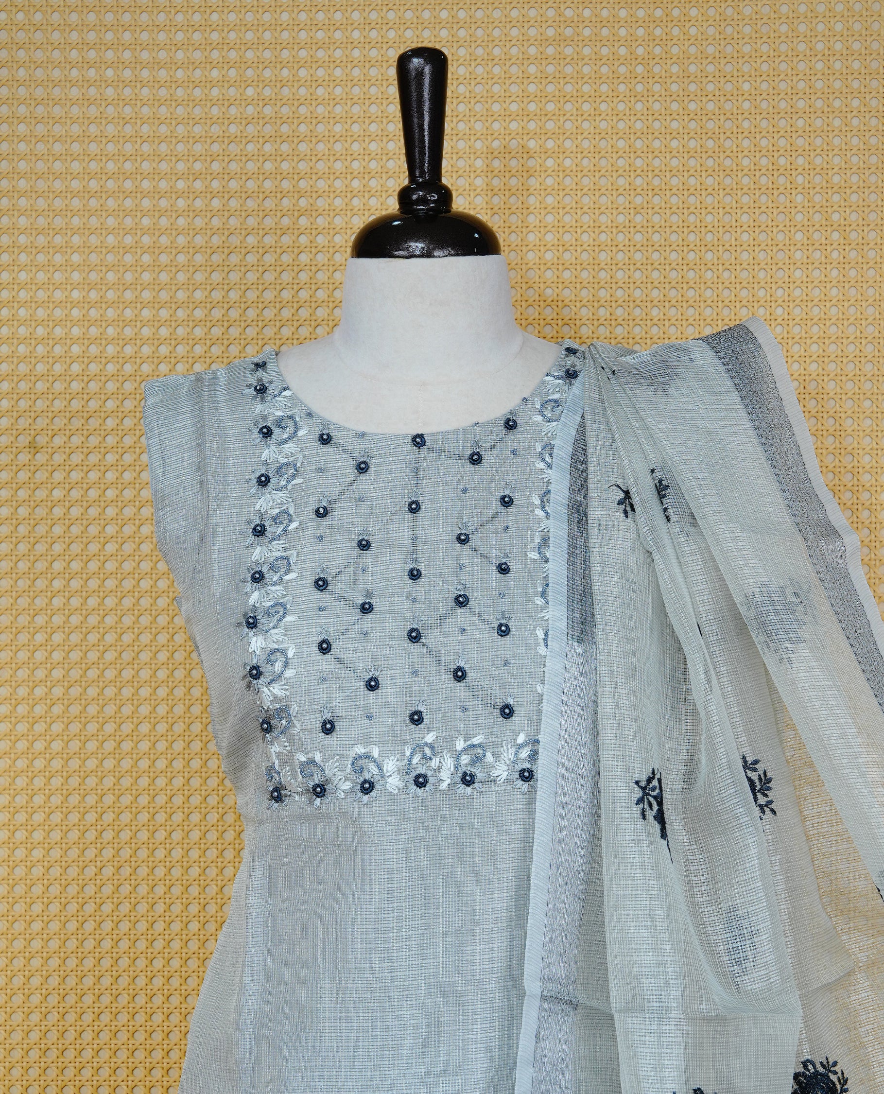 Pastel Grey Tissue Churidar set featuring elegant floral embroidery and bead work on the yoke, paired with matching solid pants and dupatta.