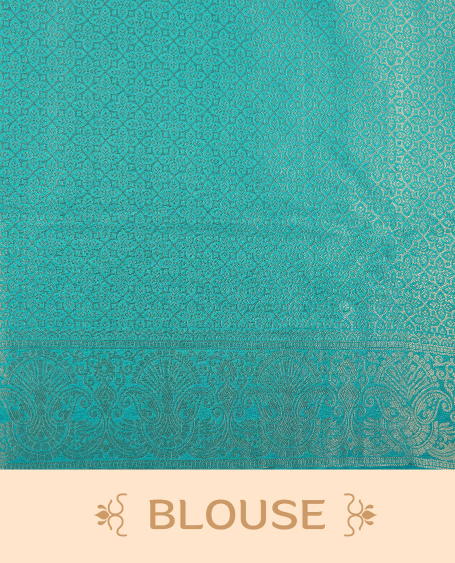 Teal green colour semi soft silk brocade saree featuring elegant self-woven floral motifs on the body, finished with an intricately detailed matching border and pallu, paired with a coordinated blouse piece.