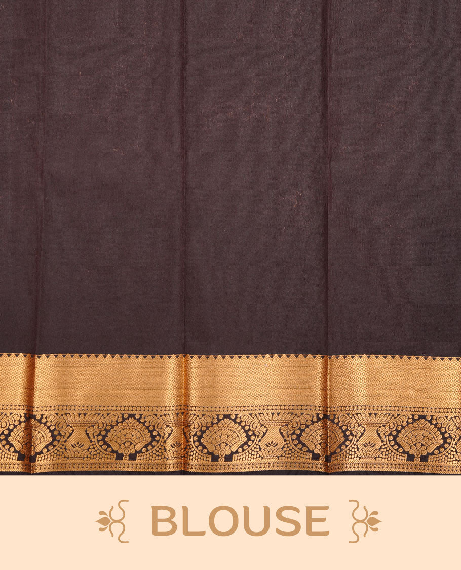 Dark chocolate colour soft silk saree featuring Gold zari stripes & motifs on body, complemented by self colour with traditional border, paired with matching blouse piece.