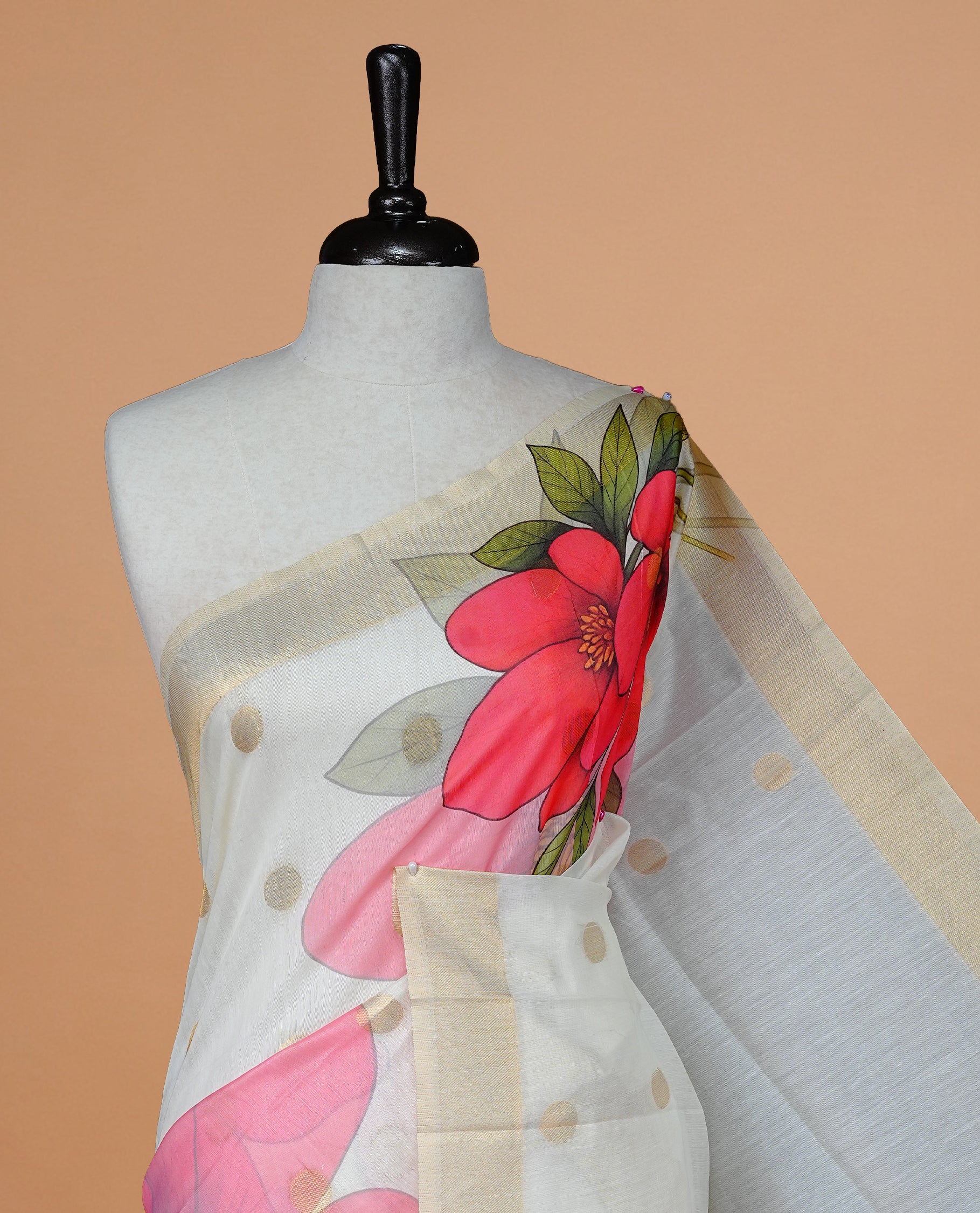 Cream Colour Organza Kerala Saree Featuring Red floral Printed Motifs On The Body, Enhance By A Gold Zari, Paired With A Matching Blouse Piece.