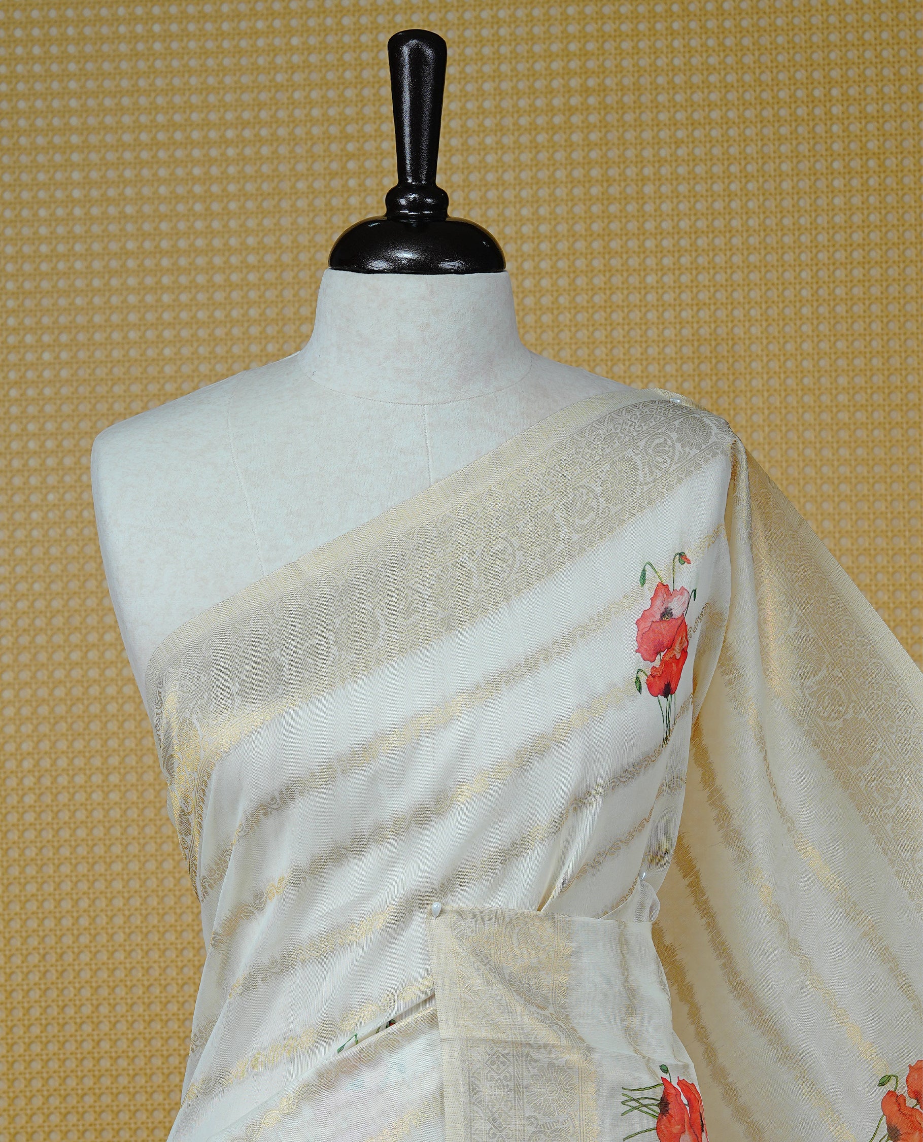 Cream Colour Organza Kerala Saree Featuring Gold Zari Strips & Floral Printed Body, Enriched By A Light Gold Zari Border, Paired With A Matching Blouse Piece.