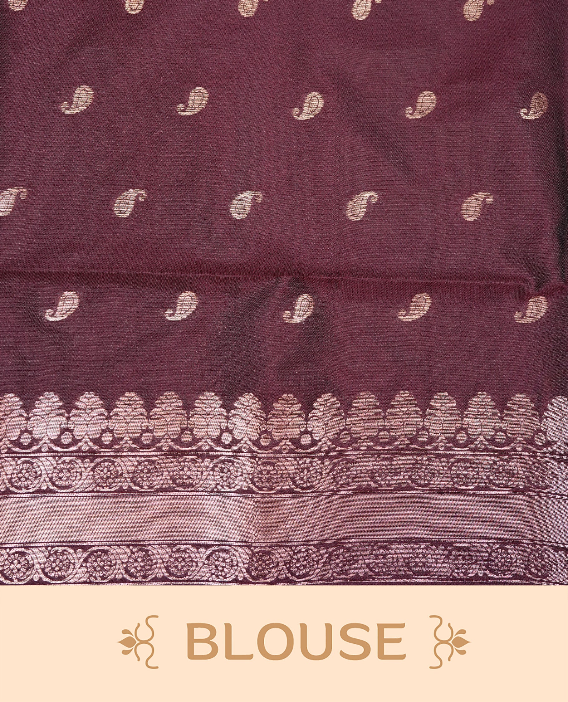 Maroon Colour Softie Silk Saree Featuring An All Over Gold Woven Leaf Pattern, Finished With A Matching Border Adorned With Intricate Paisley And Floral Motifs, Paired With A Matching Blouse Piece.