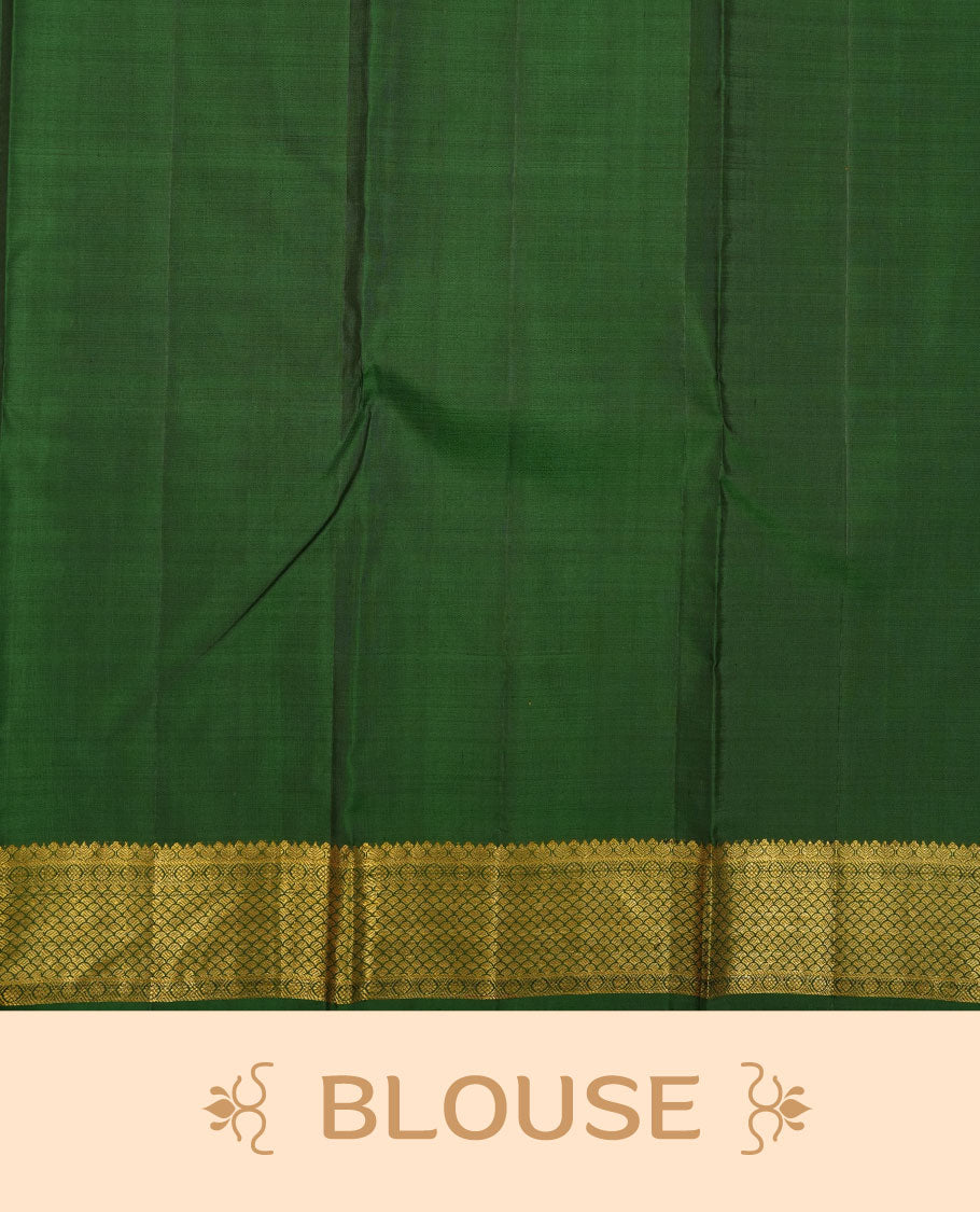 Bottle green pure traditional Kancheepuram silk saree adorned with gold zari chakra motifs across the body, featuring elegant gold zari traditional borders, beautifully paired with a matching blouse piece.