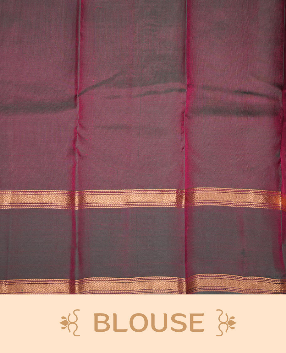 Reddish pink colour vasundhara silk saree featuring zari buttas on body, complemented by contrast green with zari border, paired with matching blouse piece.
