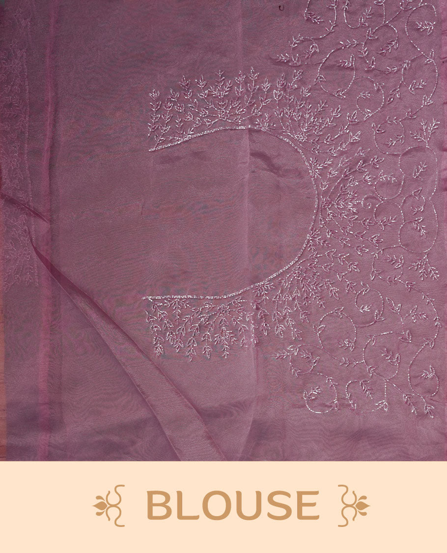 Pink colour Organza designer saree featuring a thread geometric pattern across the body, enhanced with a piping border and cut beats work on matching blouse piece.