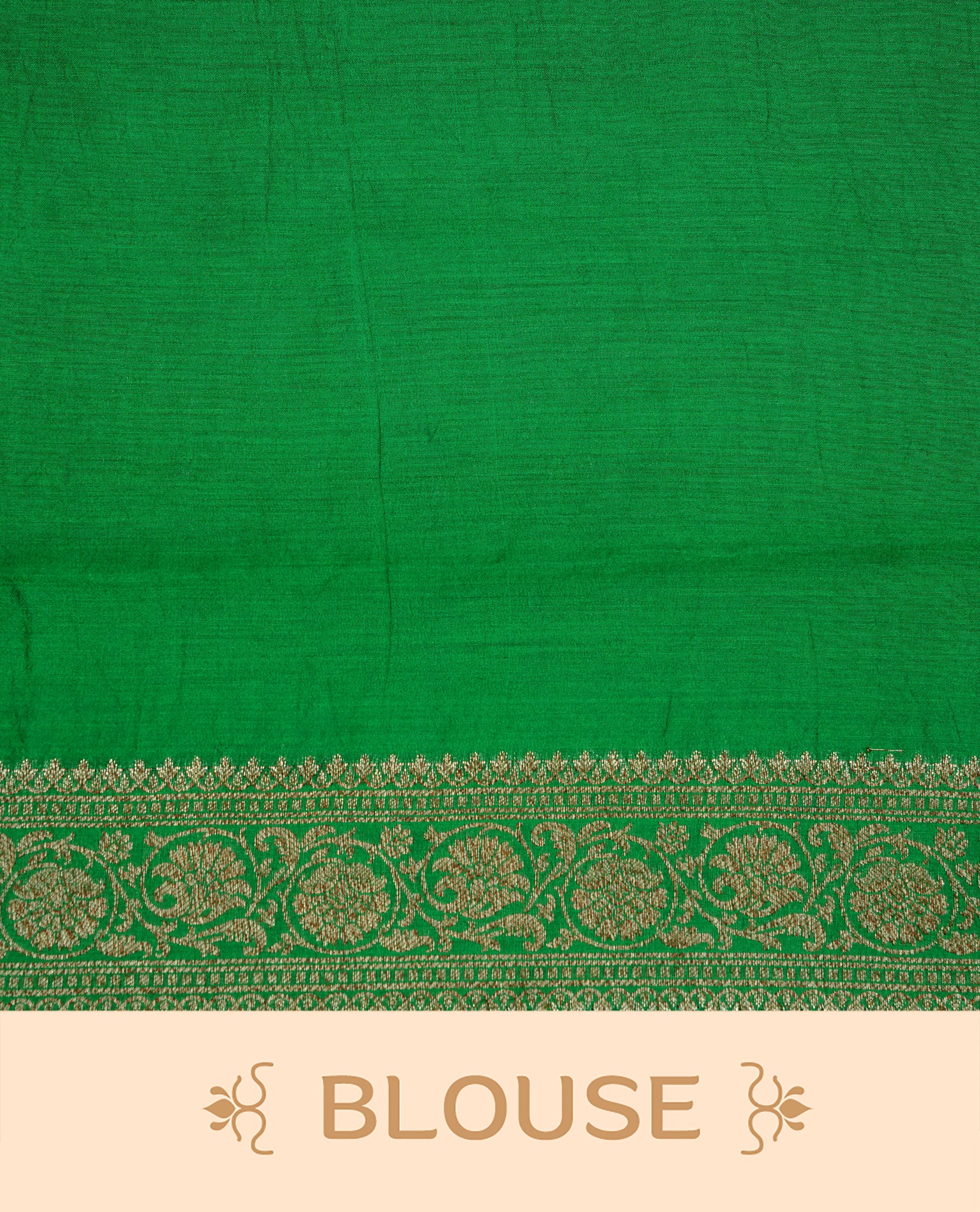 Magenta colour pure tussar Banaras silk saree featuring intricate gold zari motifs across the body, enhanced with a contrast green floral kodi zari border for a rich traditional look. Comes with a matching blouse piece.