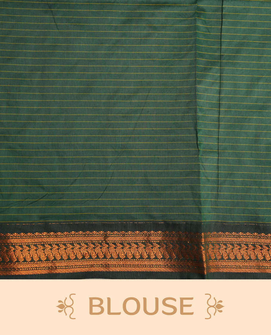 Mustard colour kalyani cotton saree featuring gold zari motifs on body, complemented by contrast green color with copper zari pattern border , paired with matching blouse piece.