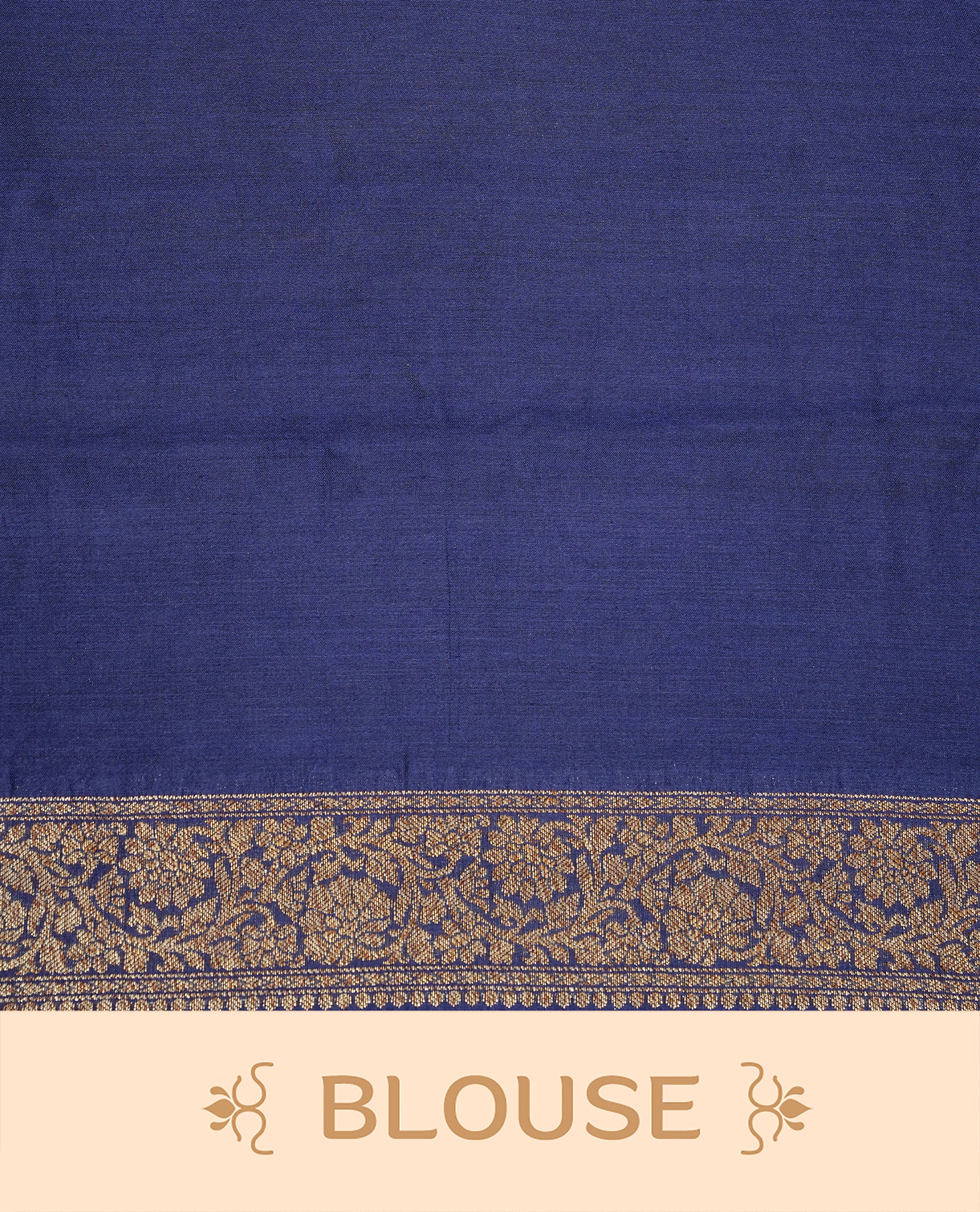 Cream colour Banaras tussar silk saree featuring elegant gold zari buttas across the body, complemented by a contrast Navy Blue border with rich zari detailing. Comes paired with a matching blouse piece.