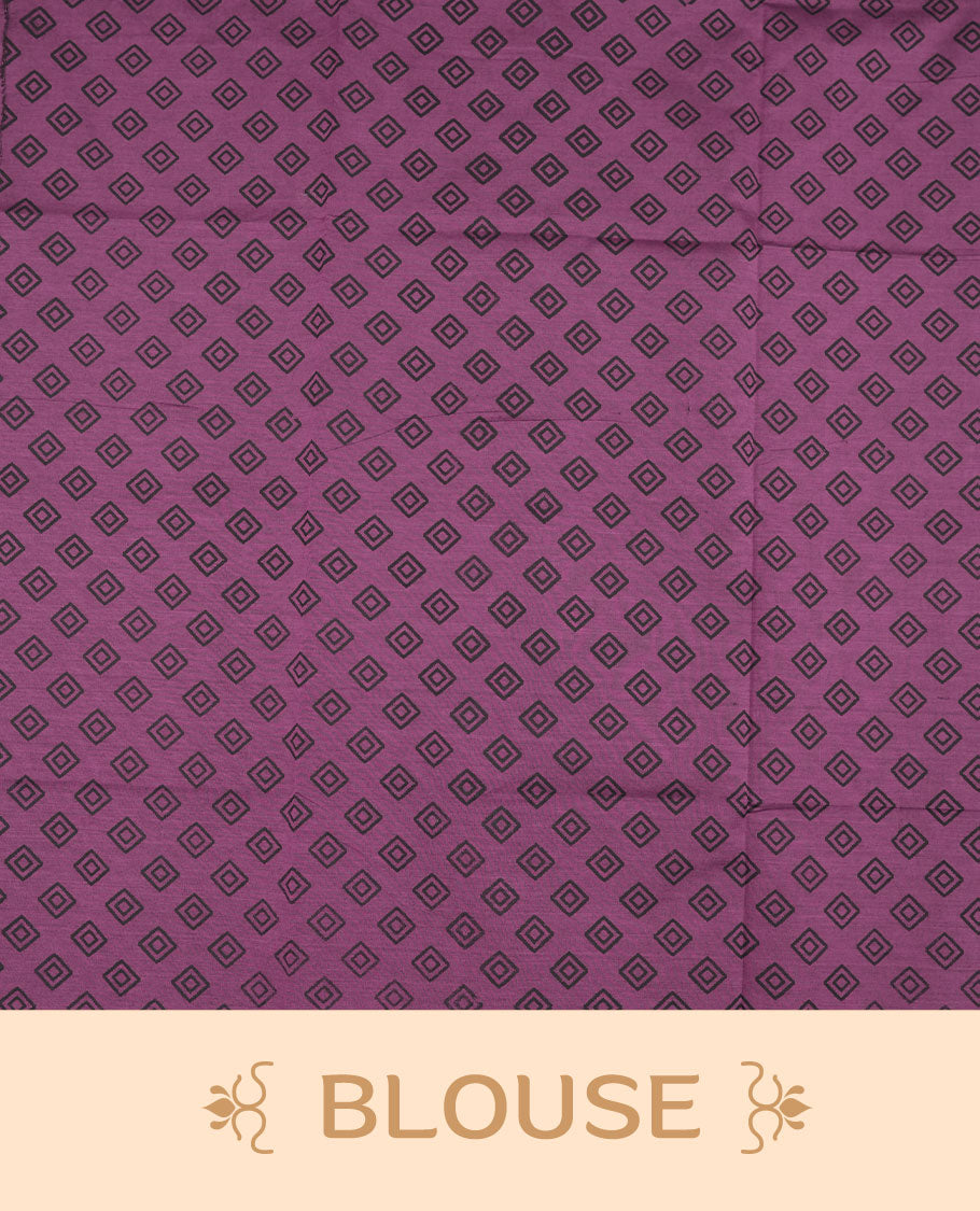 Purple colour poly cotton saree with black temple motifs on the body, paired with a matching with black woven traditional border, and a coordinated all‑over geometric printed blouse piece.