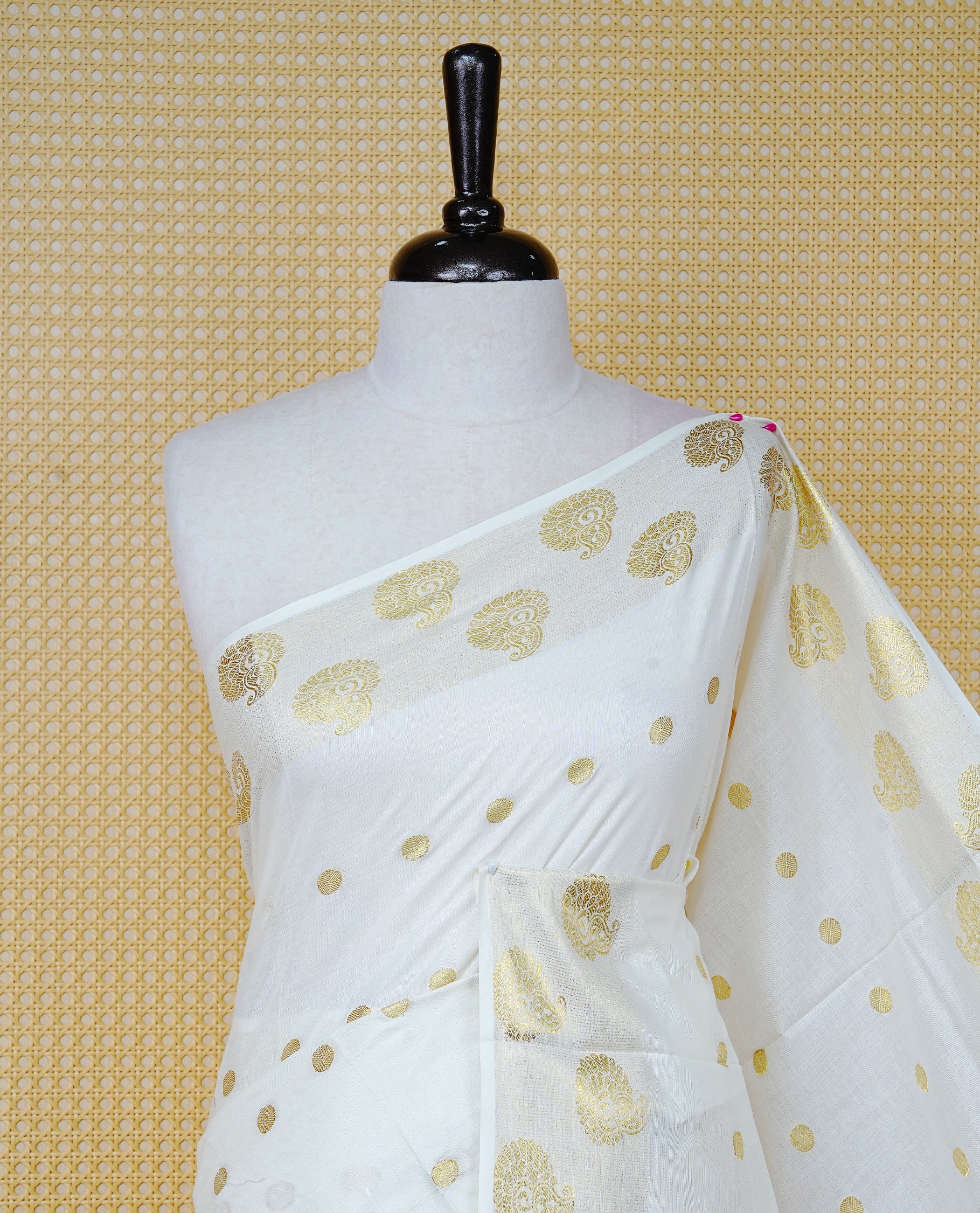 Cream Colour Cotton Kerala Saree Featuring Gold Zari Dot Motifs Across the Body, Enhanced with a Gold Zari Border and Traditional Gold Zari Pallu, Paired with Matching a Blouse Piece