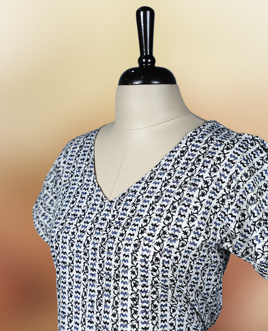 Off white, blue & black colour paisley print night wear with a flattering V neckline & Designed for comfort & style, A perfect pick for casual days, summer outings, or light festive wear.