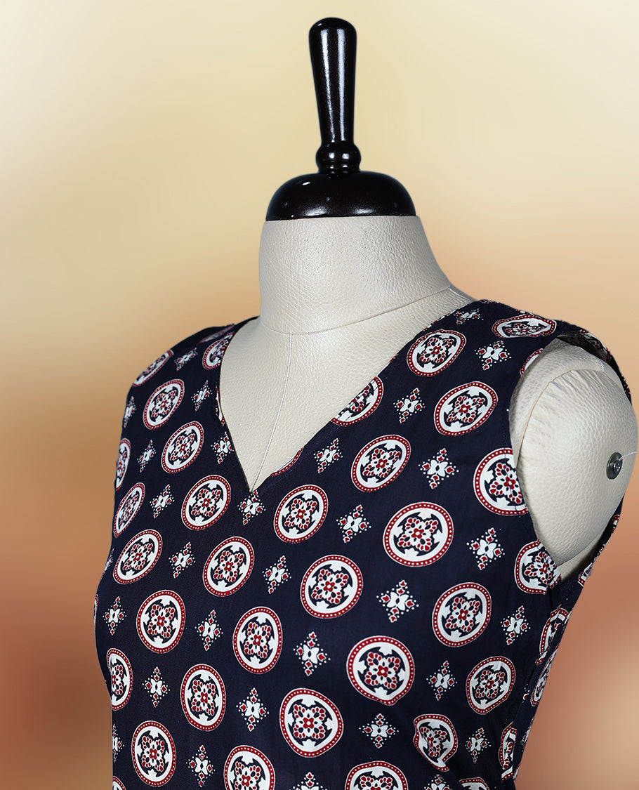 Black colour sleeveless nightwear with stylish white circular prints and a flattering V neckline, Tailored for comfort with a flared hem, perfect for casual outings, daily wear, or relaxed summer days.