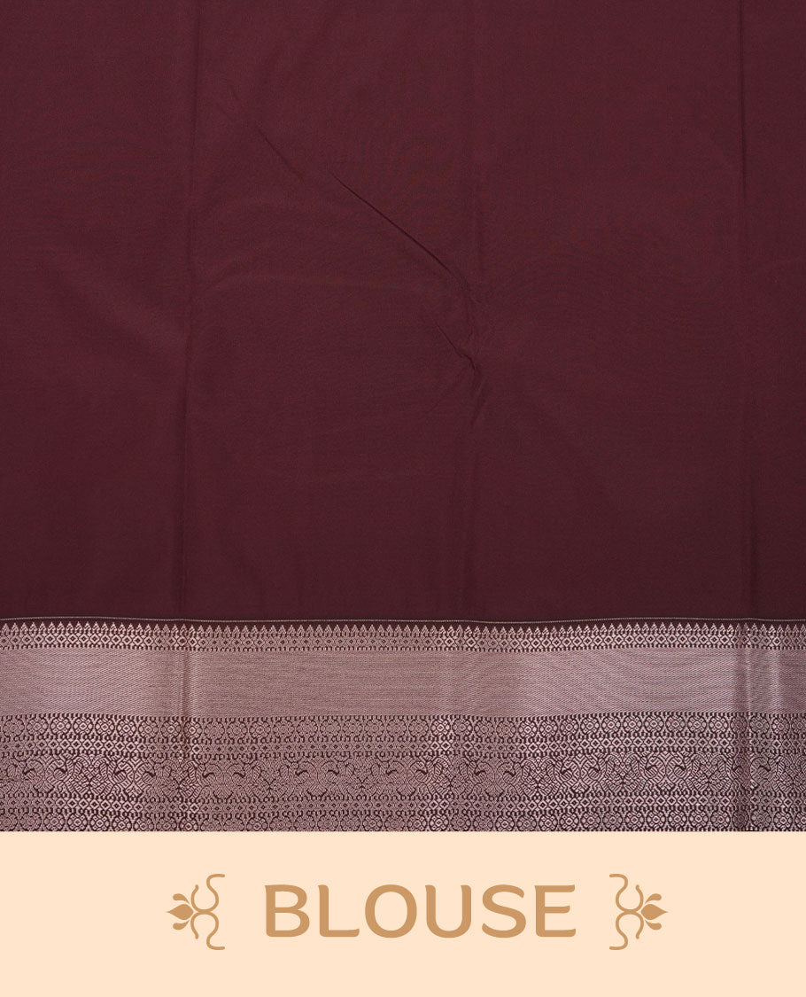 Rust orange colour semi silk saree featuring gold zari floral motifs on body highlighting contrast dark chocolate rose gold zari peacock border , paired with matching blouse