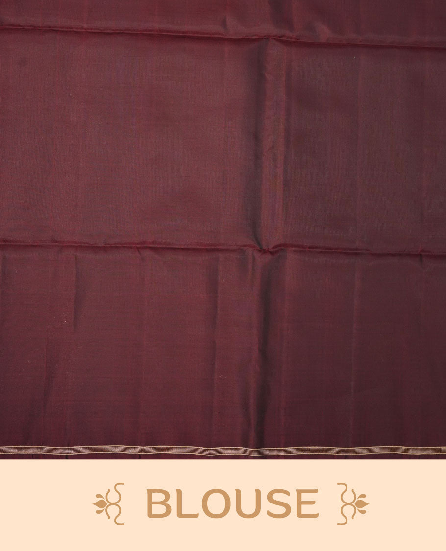 Chocolate Brown colour mayuri silk saree featuring gold zari motifs on body, complemented by self colour with traditional border with tassel at pallu, paired with matching blouse piece.
