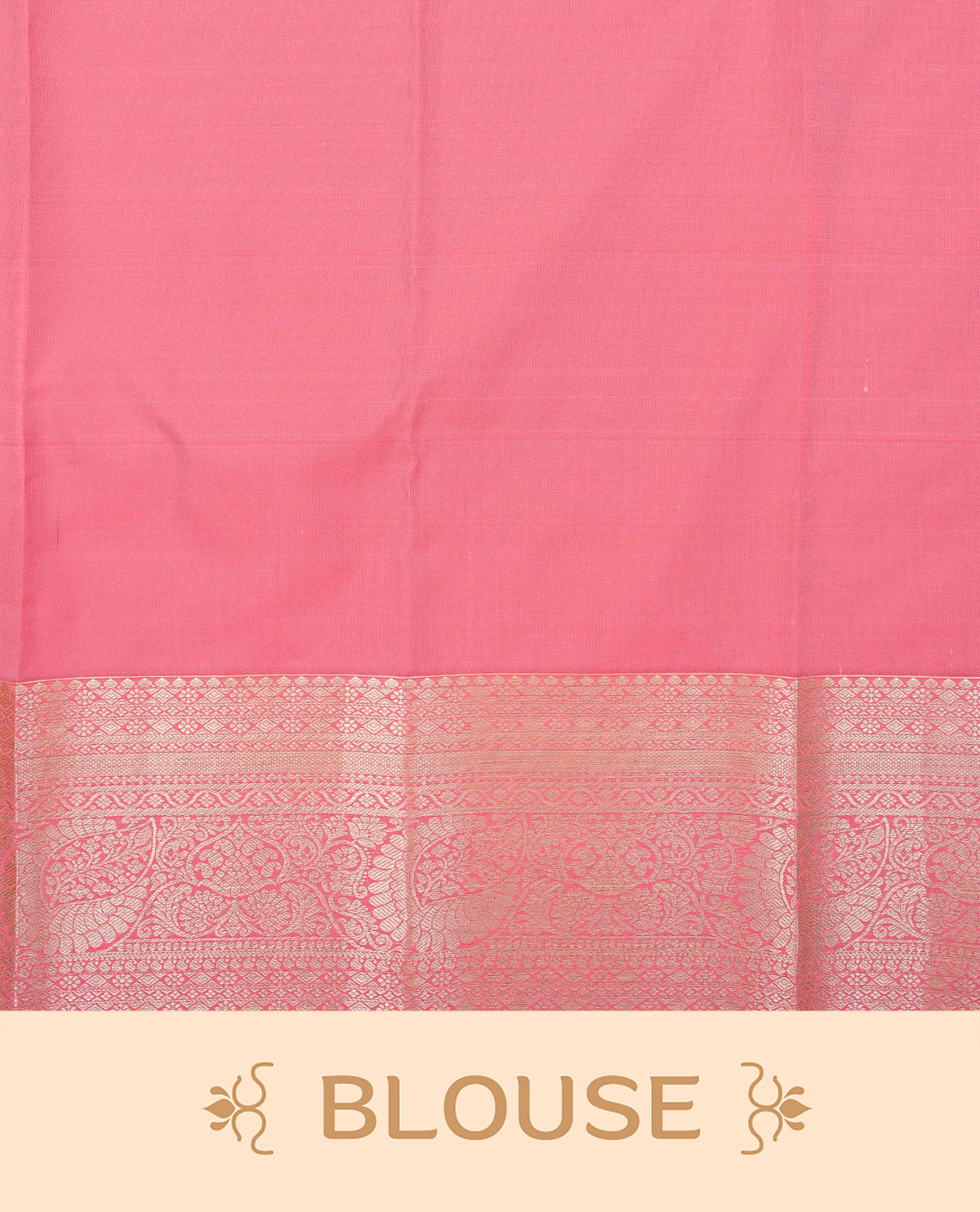 Pink colour semi wedding saree featuring light gold zari strips with peacock and chakra motifs across the body, complemented by contrast self colour traditional border. Comes with a matching blouse piece.