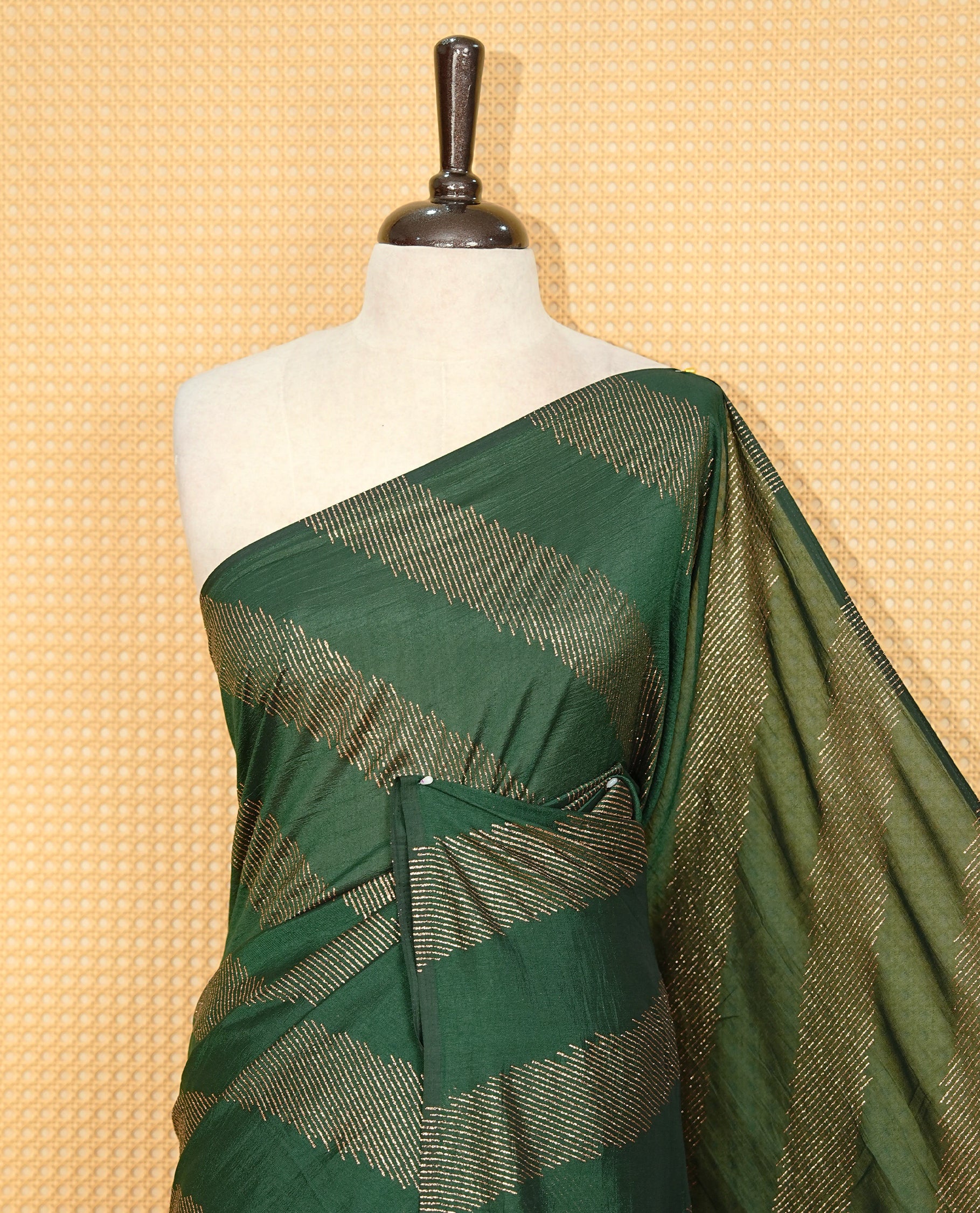 Green colour Vijitra silk Saree Featuring Leheriya style gold Printed body, complemented by contrast pallu & tassels
