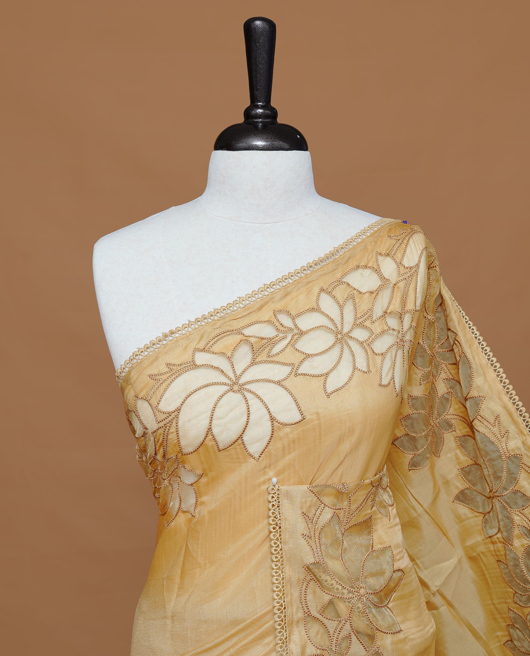 Pastel Yellow colour Designer saree Featuring Elegant plain body, enhance with thread Lotus Pattern with lace border, paired with matching blouse piece.