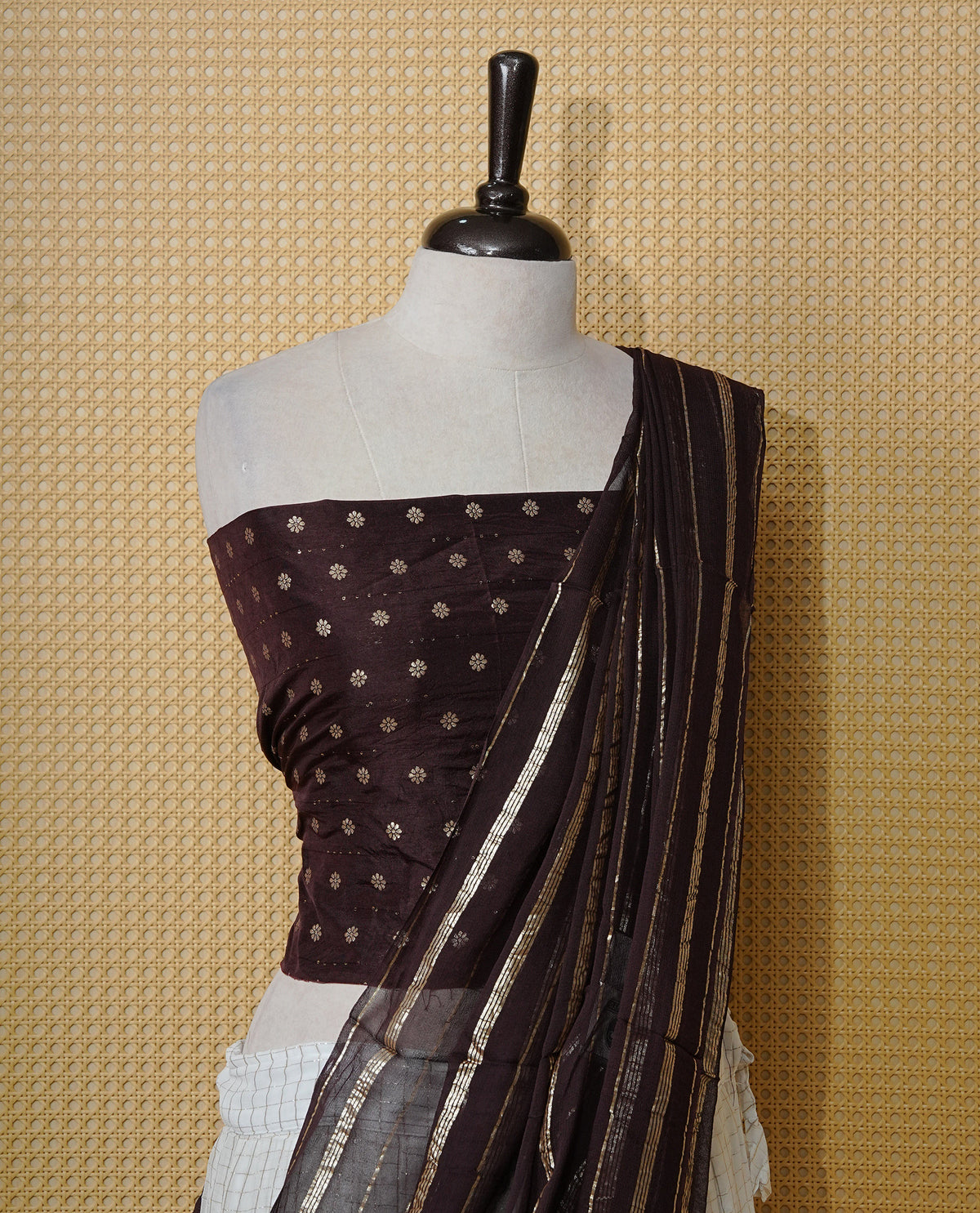 Off white colour Semi stitched dhavani set featuring Gold zari check pattern with contrast Chocolate colour border skirt, paired with matching blouse & dupatta.