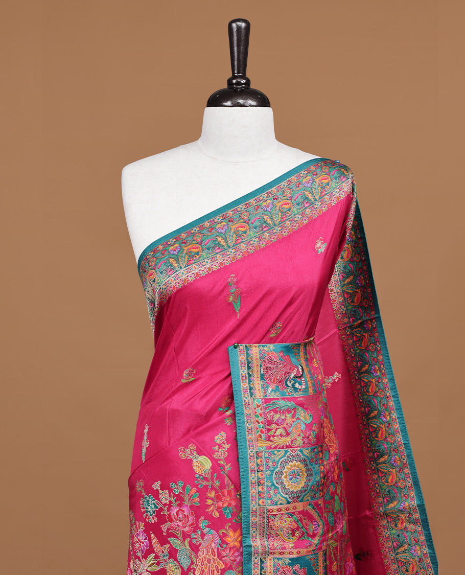 Pink colour Pashmina silk saree features an all over Multi colour with floral kodi motifs body, a self colour with multi colour box with motifs and pallu, and a matching unstitched blouse.