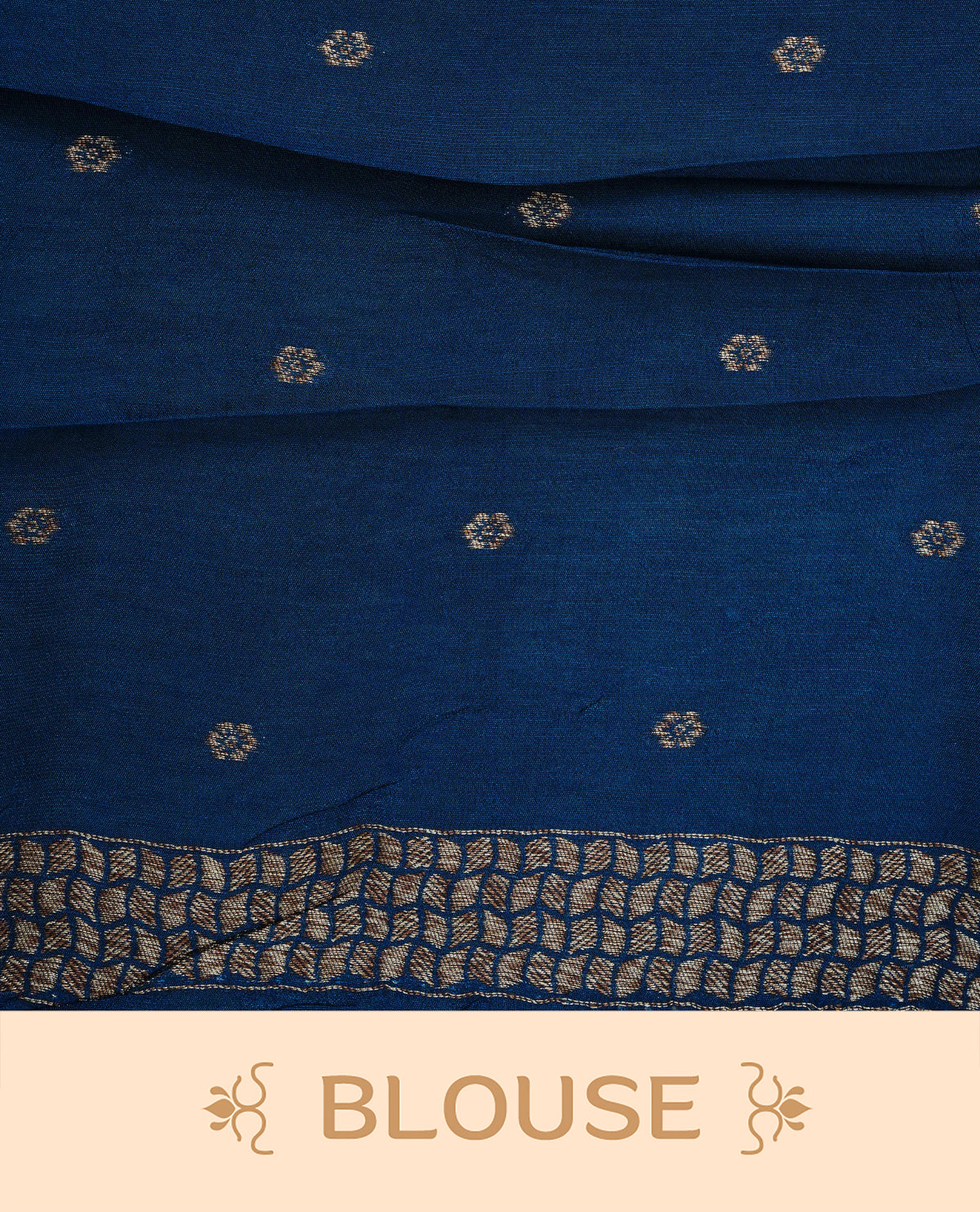 Dark blue colour semi banaras tussar georgette saree featuring gold zari geometric pattern on body, finished with gold zari geometric pattern border and paired with matching blouse piece.
