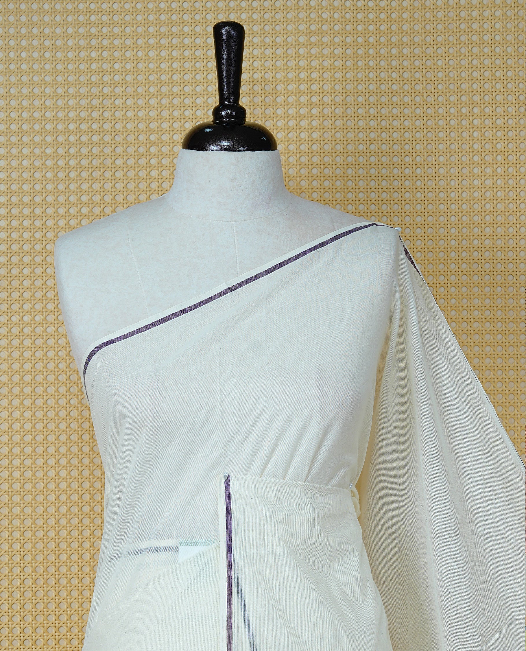 Cream Colour Cotton Kerala Saree Featuring A Classy Plain Body For Effortless Elegance, Enhanced By A Minimalist Grape Border, Paired With A Matching Blouse Piece