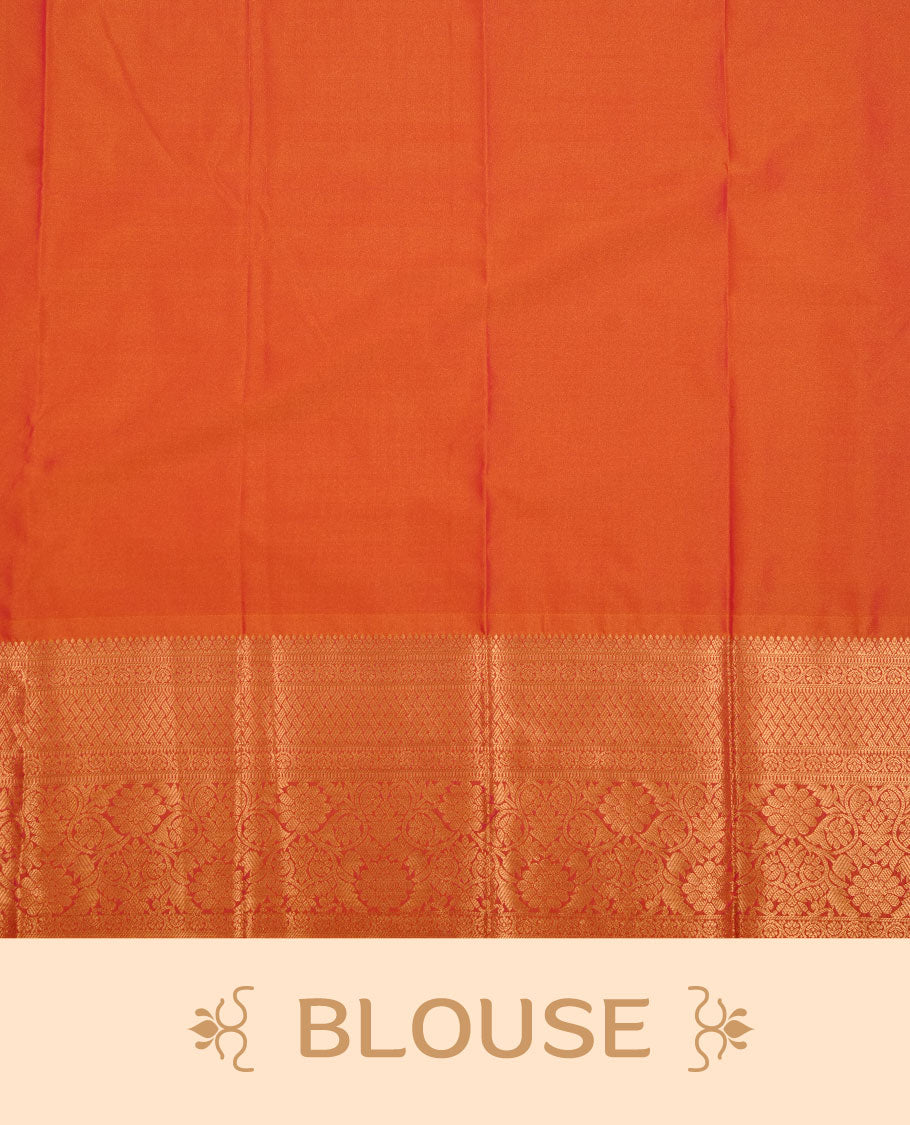 Orange colour soft silk saree featuring Gold zari motifs on body, complemented by self colour with traditional border, paired with matching blouse piece.