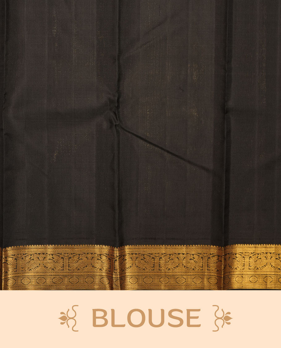 Mustard yellow colour pure traditional Kancheepuram silk saree featuring elegant contrast black zari traditional borders, beautifully paired with a matching blouse piece.