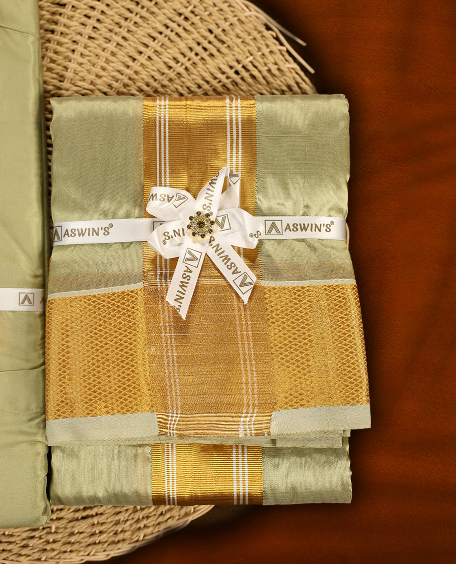 Fir green colour Aswin’s wedding set featuring a premium silk shirt, matching dhoti with rich golden zari border, complemented by a towel and fragrance, crafted for graceful festive celebrations.