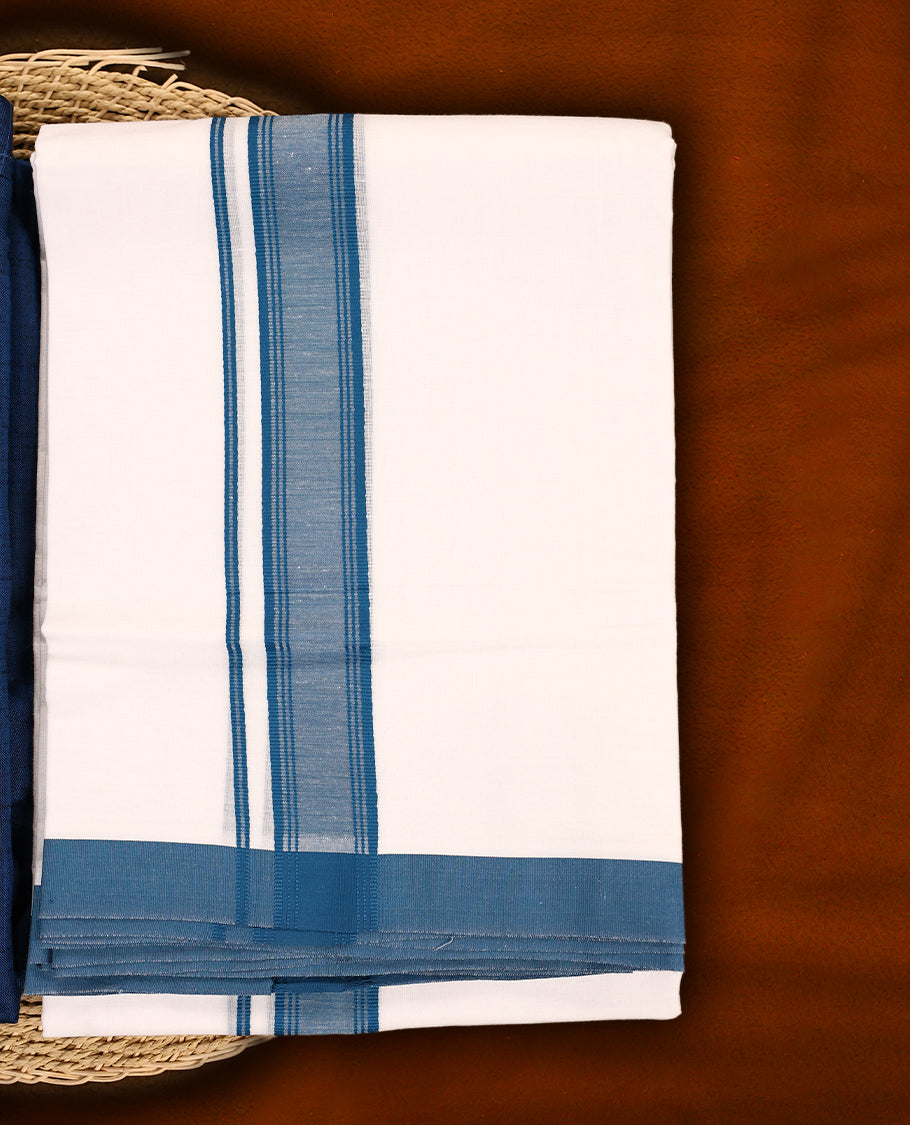 RAMRAJ Navy blue kurtha paired with a white dhoti, elegantly finished with a matching Navy blue border.