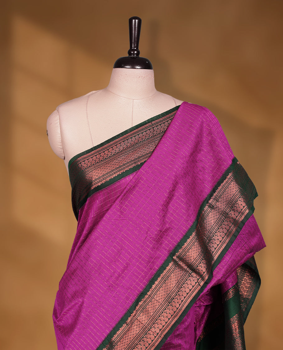 Magenta colour kalyani cotton saree featuring Antique zari check pattern on body, contrast Green colour border with antique zari pattern, paired with matching blouse piece.
