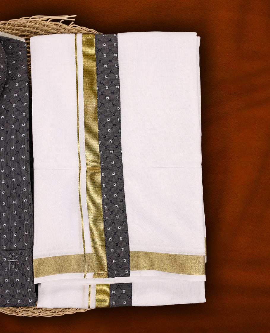 Dark grey colour MCR printed shirt featuring subtle all over motifs, paired with a white dhoti highlighted with an elegant golden zari kara and a matching dark grey printed border.