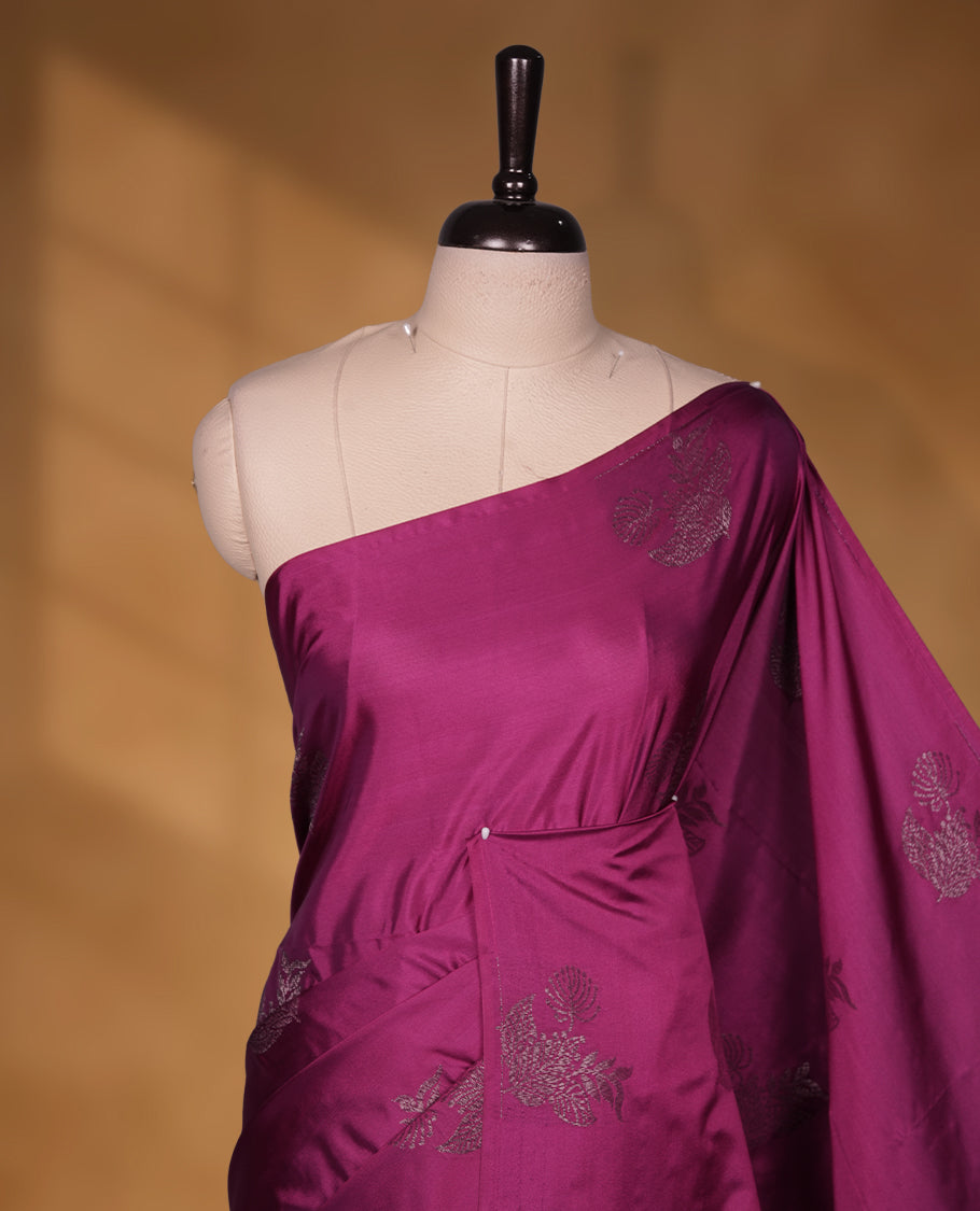 Boysenberry colour soft silk saree featuring Antique zari motifs on body with Highlighting contrast Navy blue colour pallu and paired with matching blouse piece.