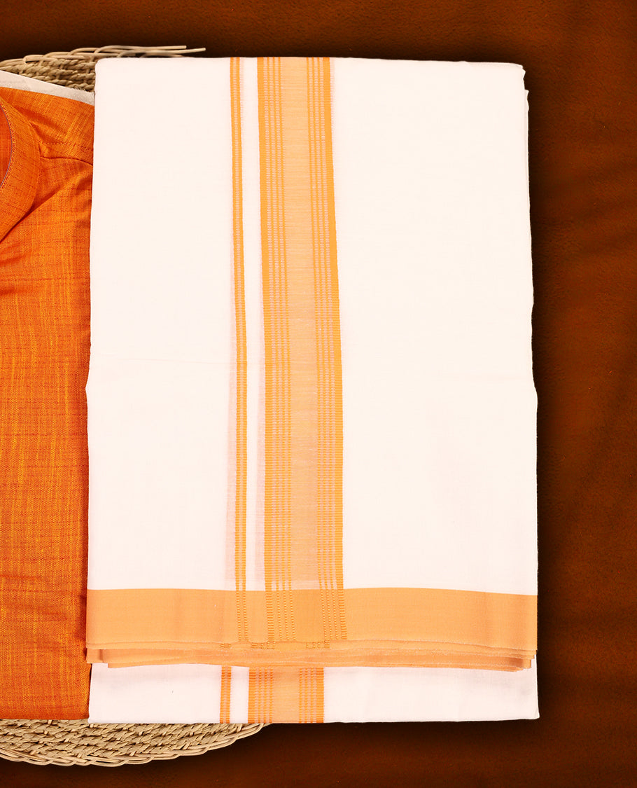 RAMRAJ Orange kurtha paired with a white dhoti, elegantly finished with a matching Orange border.