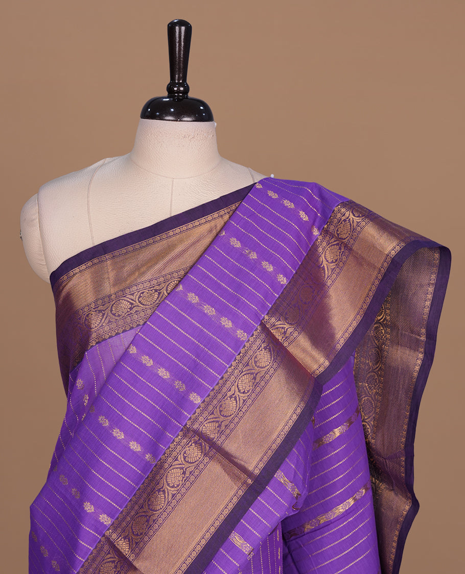 Medium Purple colour chettinad cotton saree featuring gold zari stripes on body, complemented by gold zari border, paired with matching blouse piece.