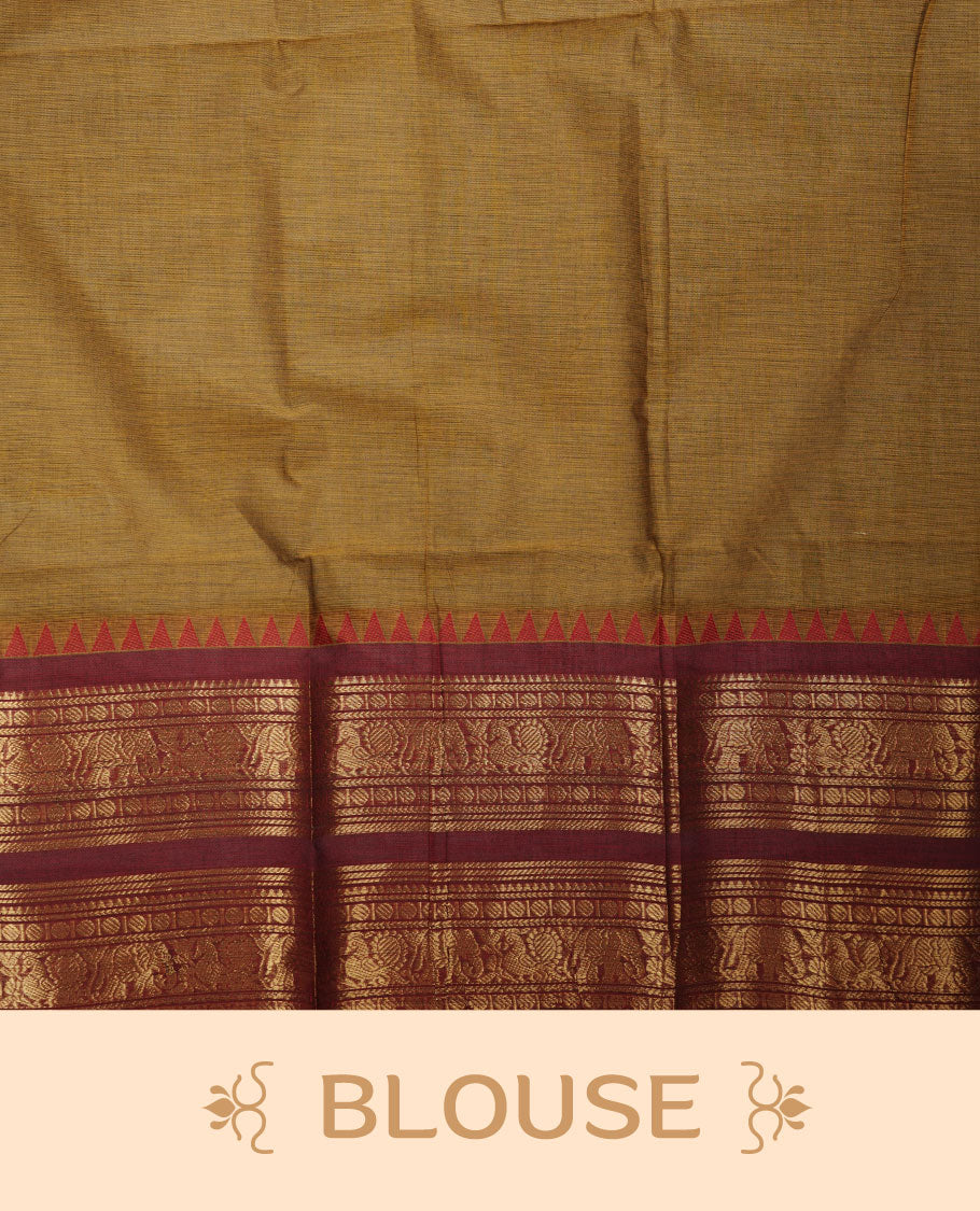 Mustard colour chettinad cotton saree featuring plain body, paired with a black colour traditional gold zari border paired with matching blouse.