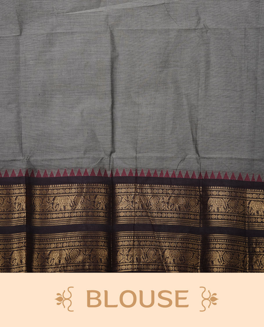 Grey colour chettinad cotton saree featuring plain body, paired with a black colour traditional gold zari border paired with matching blouse.