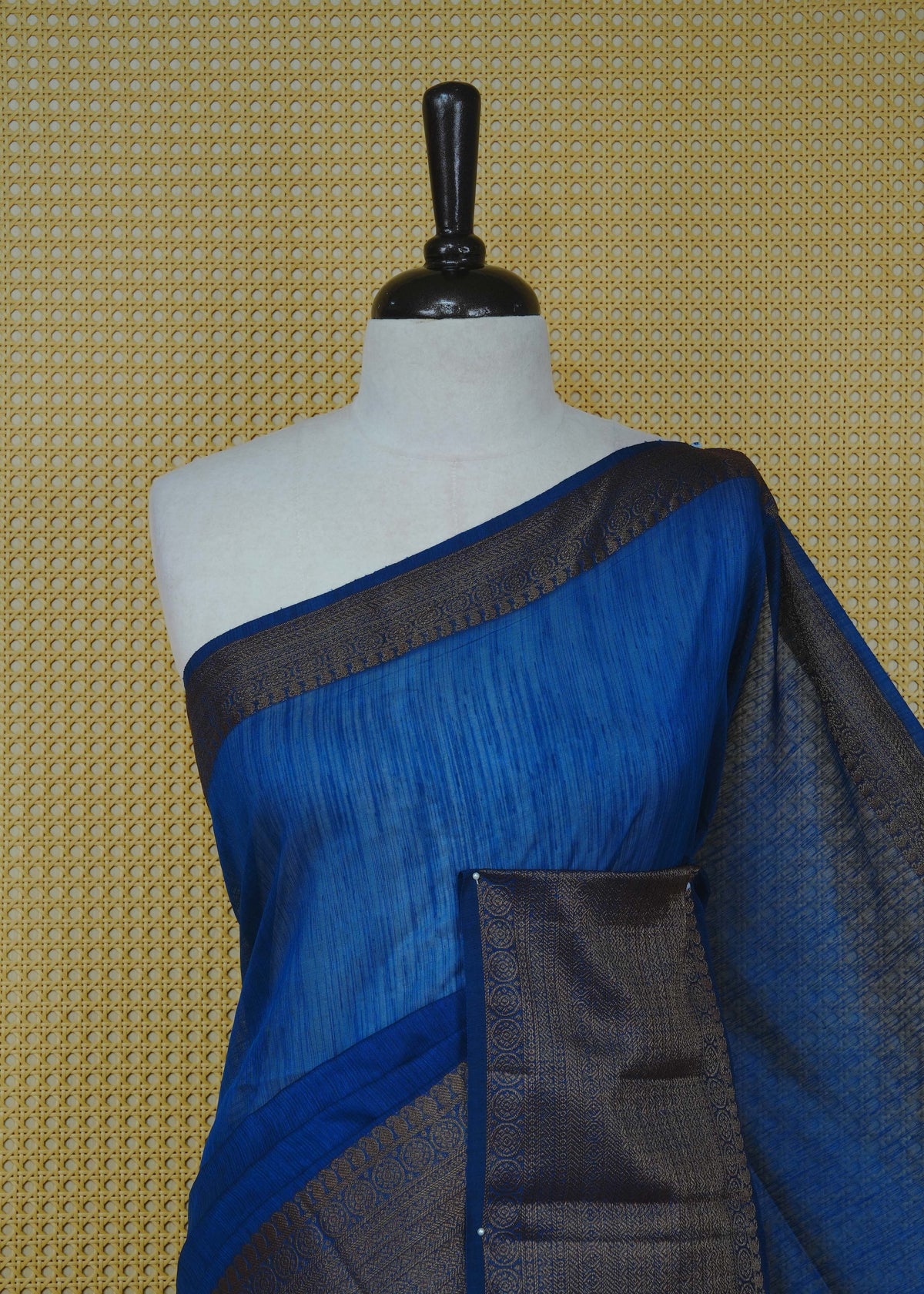Blue colour semi linen saree plain body, contrast self colour gold zari detailed border, grand pallu comes with matching blouse piece