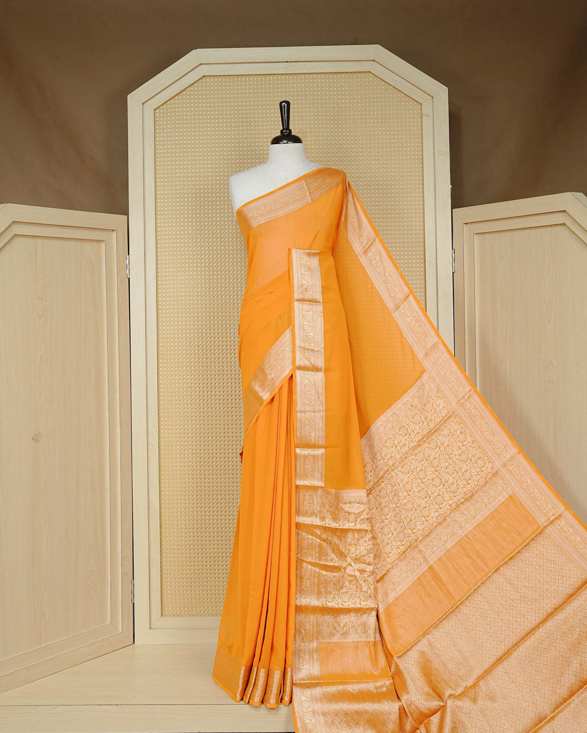 Yellow colour georgette saree having plain boy, Floral Gold zari detailed pattern border, comes with matching blouse piece