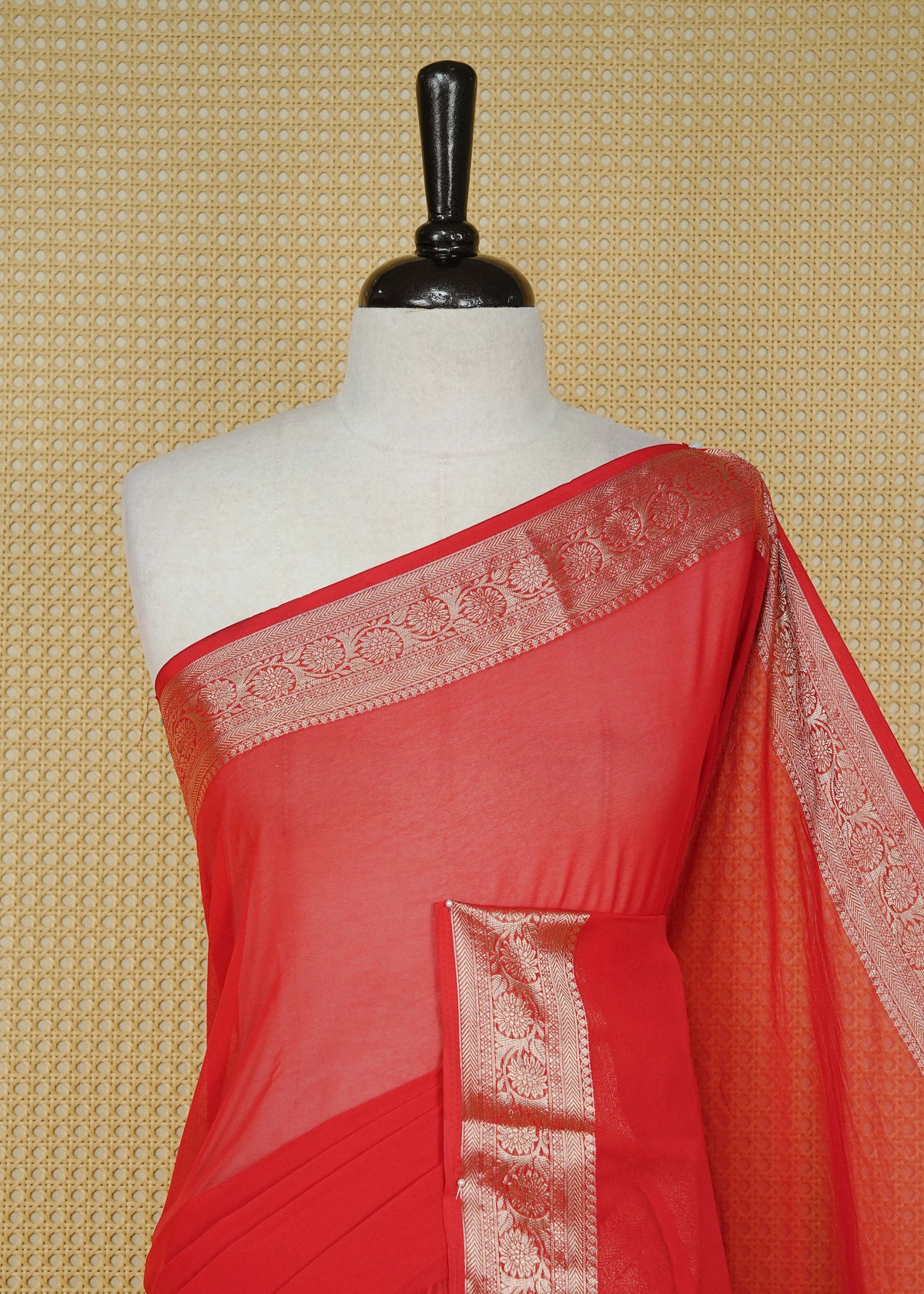 Vibrant red colour georgette saree having plain boy, Floral Gold zari detailed pattern border, comes with matching blouse piece