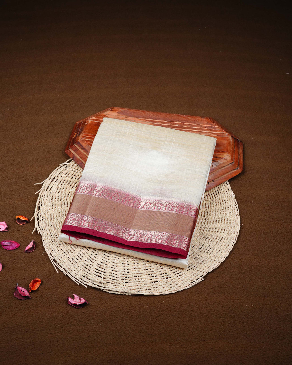 Cream colour Tussar silk saree Featuring Plain body, complemented by Contrast dark maroon colour double border with zari detailing, paired with matching blouse piece.